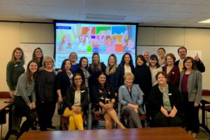Early Edge staff pose with grantees at a convening.