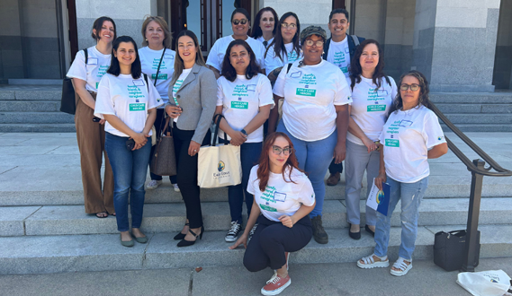 Attendees from the California Leading From Home Program stand outside at an advocacy day event.