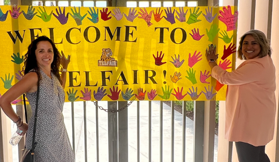 Early Edge executive director Patricia Lozano poses outside of a school with a dual immersion program.