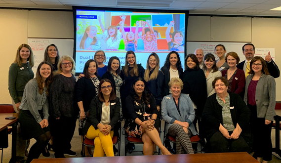 Early Edge staff pose with grantees at a convening.