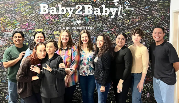 Early Edge staff poses for a pic at the Baby2Baby LA warehouse