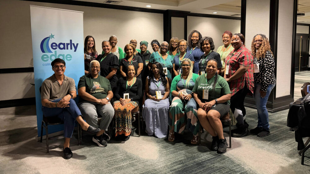 Attendees pose for a picture at the Listening Session