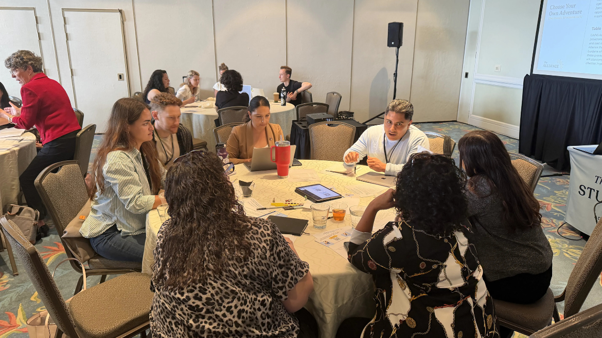Andrew Avila leads a group discussion at conference