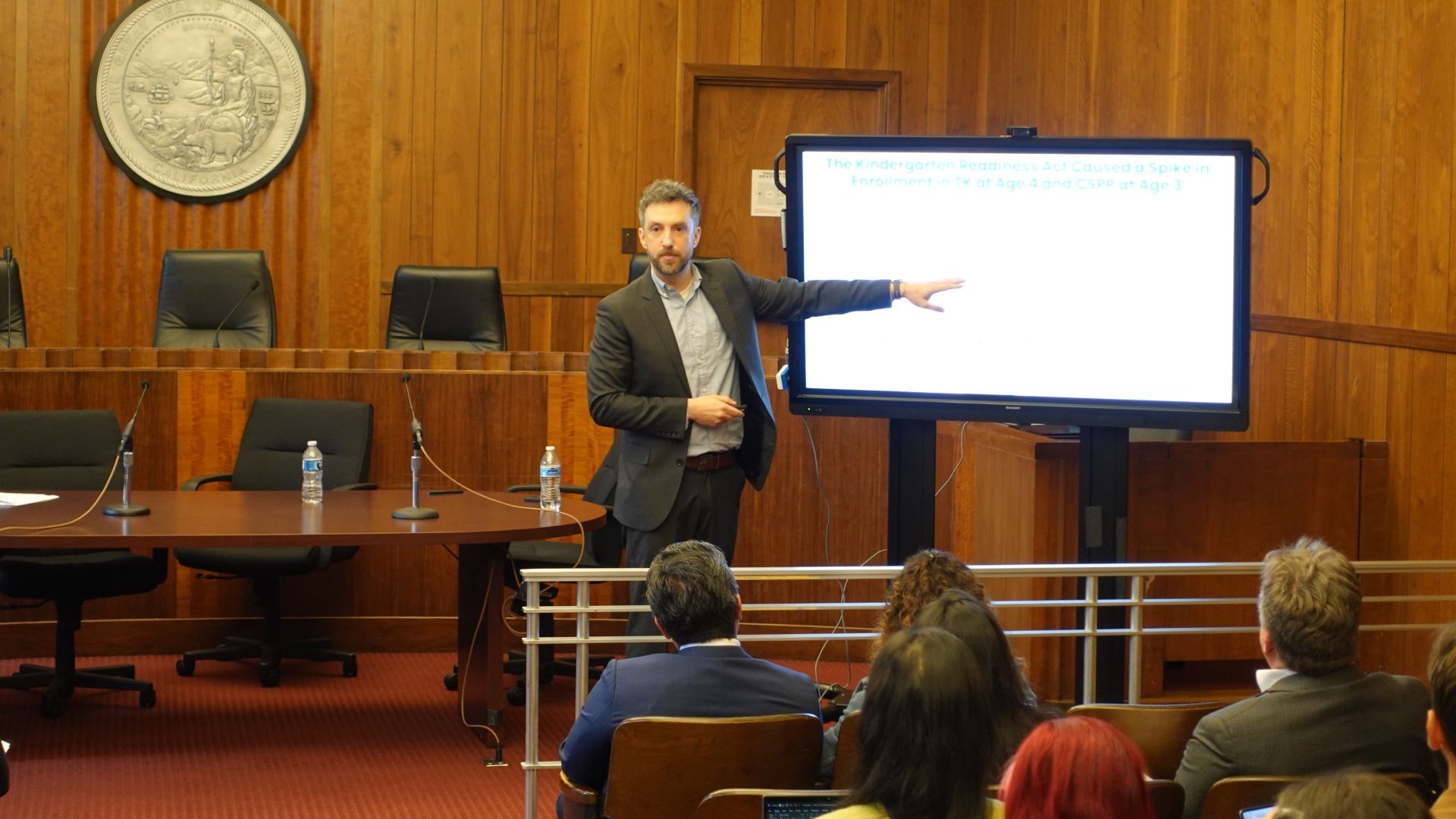 A presenter share information during the TK Payoff Meeting in Sacramento